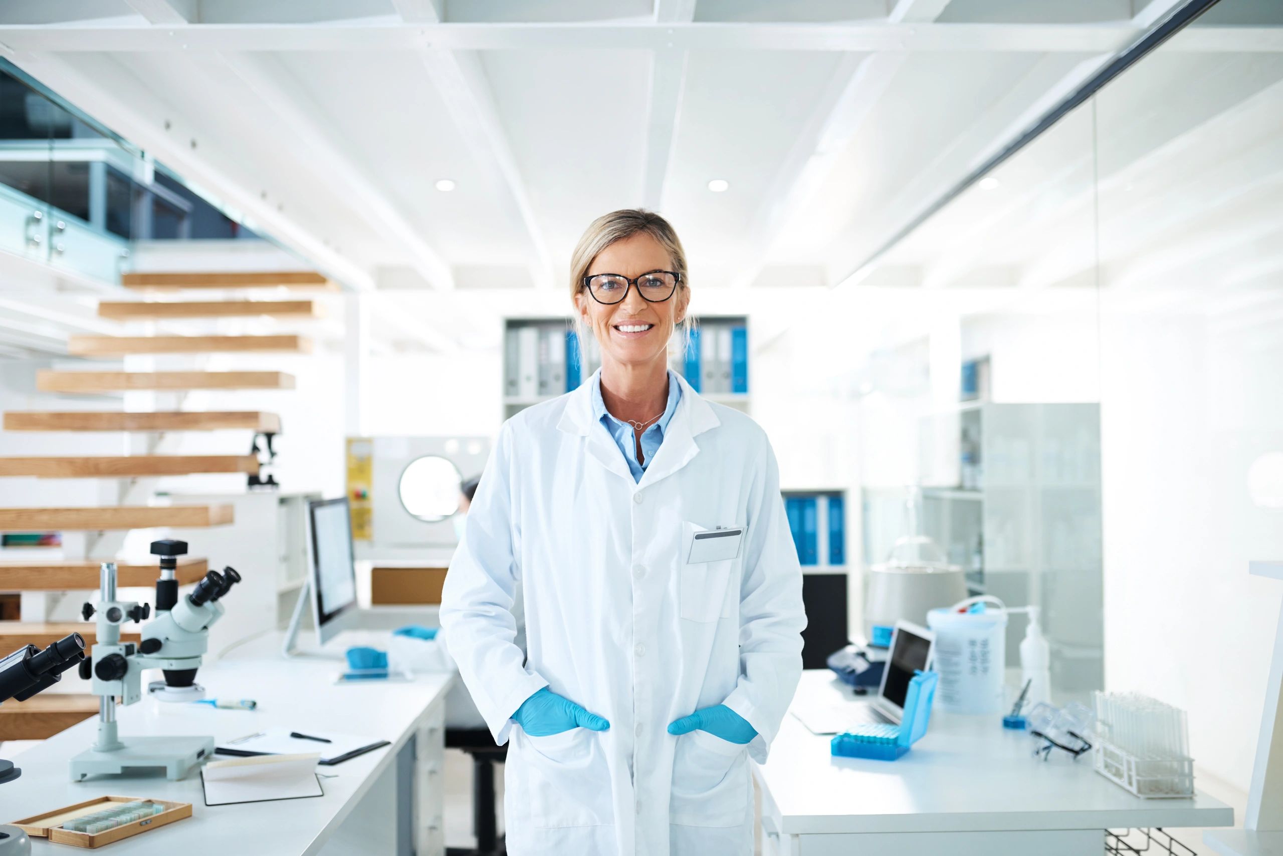 Scientist in laboratory representing evidence-based longevity medicine