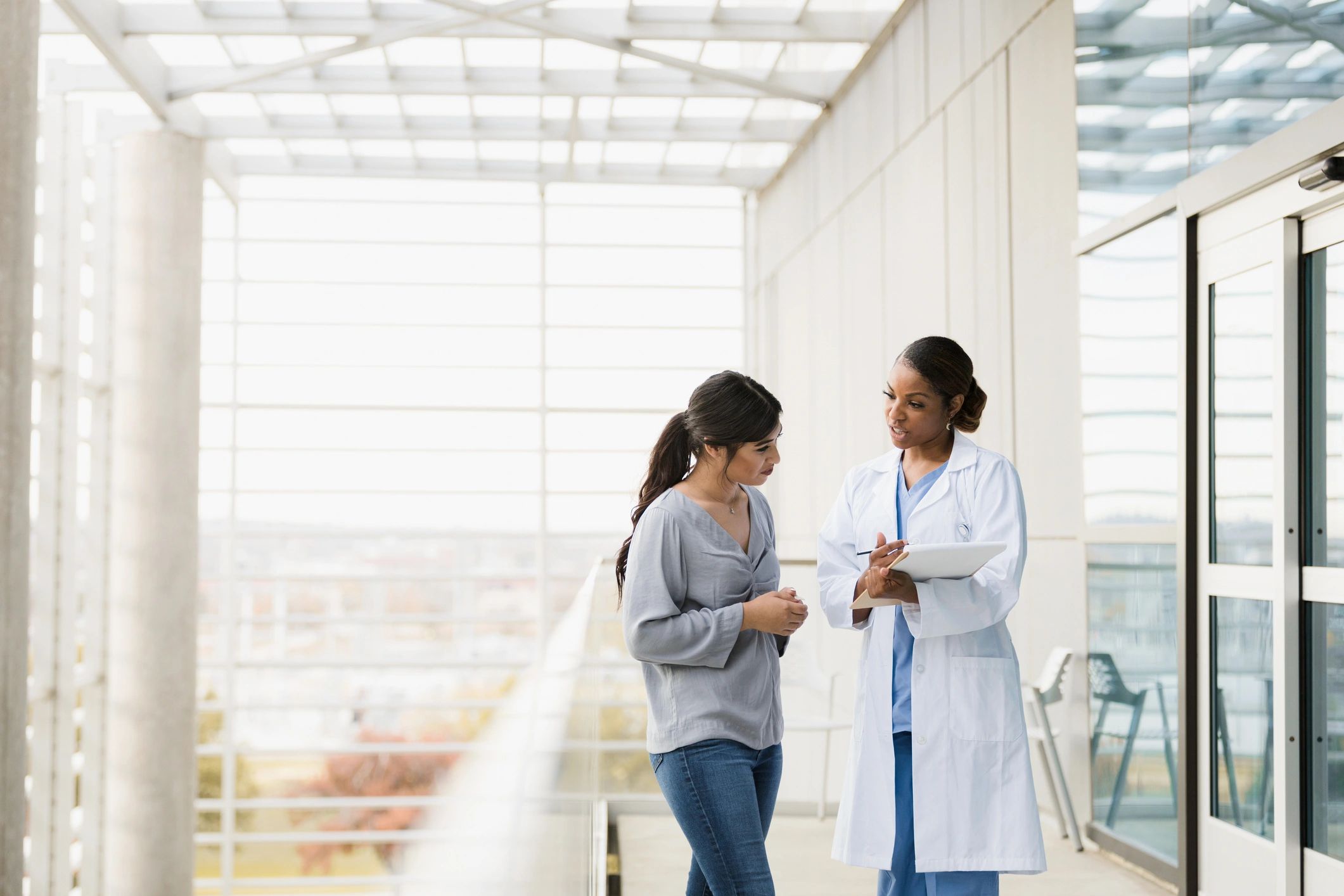 Doctor speaking with a patient during a wellness consultation