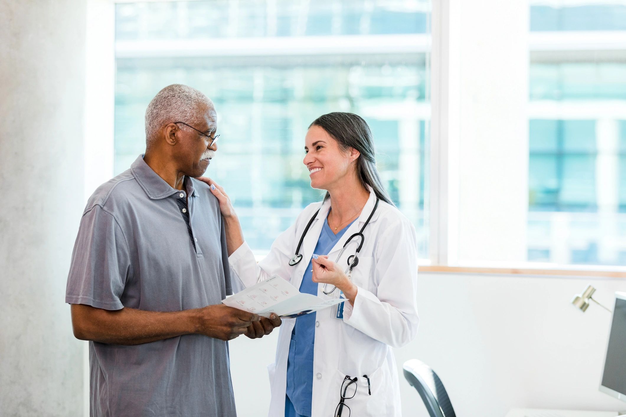 Physician offering supportive guidance to a patient