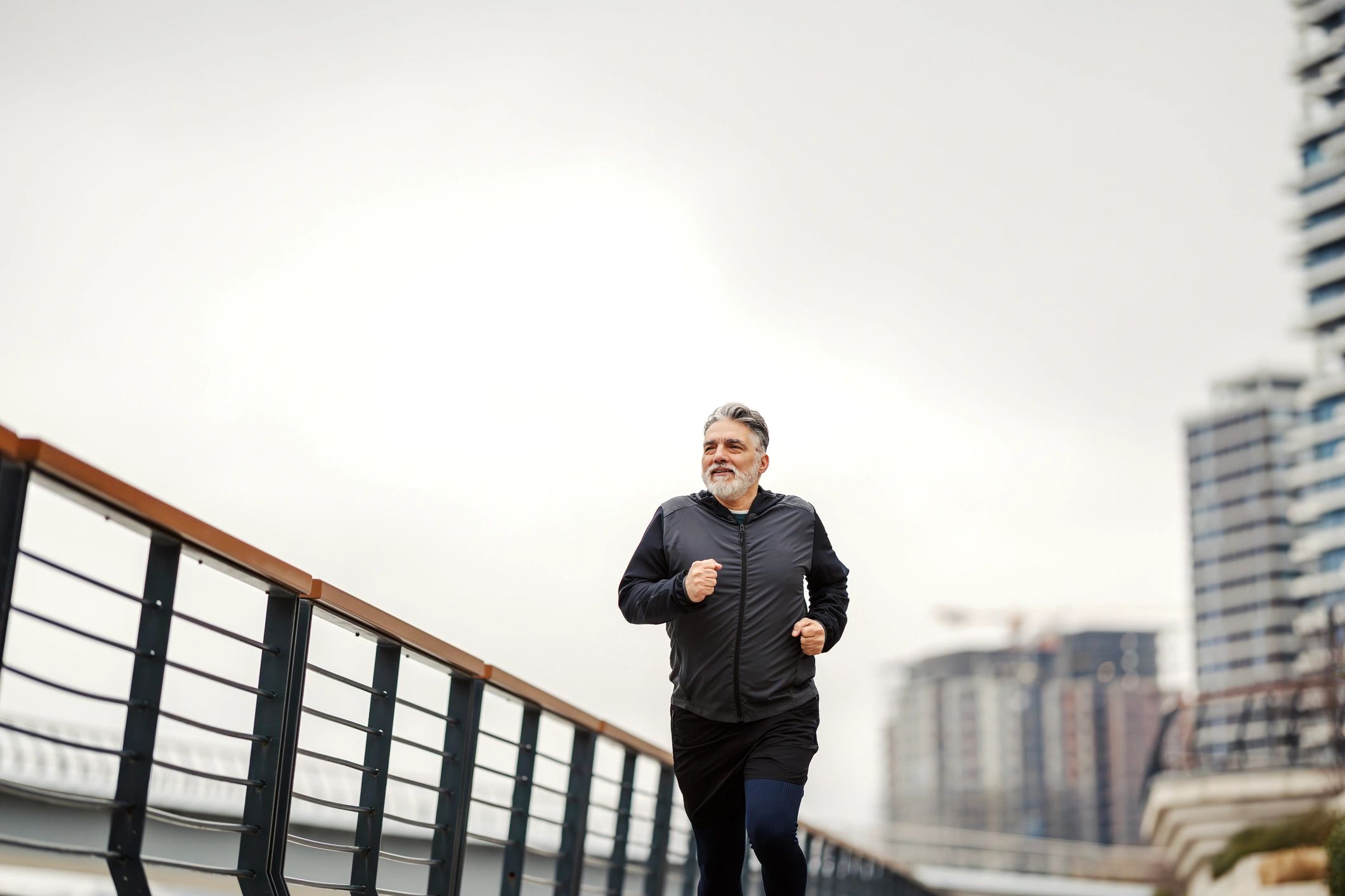 Active adult running outdoors to support metabolic health